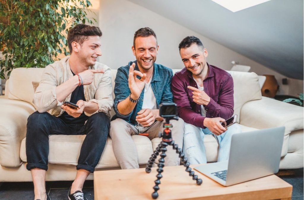 Group of male influencers in front of camera