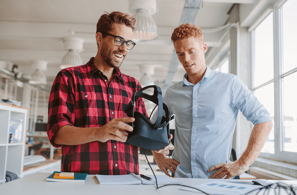 Men learning about virtual reality headset